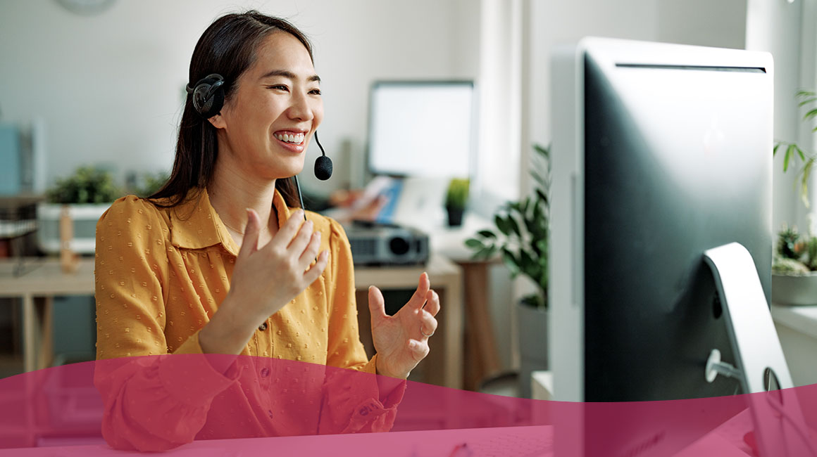 Teacher Recruitment Strategies – Rethink & Modernize Teacher in front of a computer talking to students