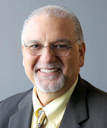 Headshot of Dr. Louis Algaze