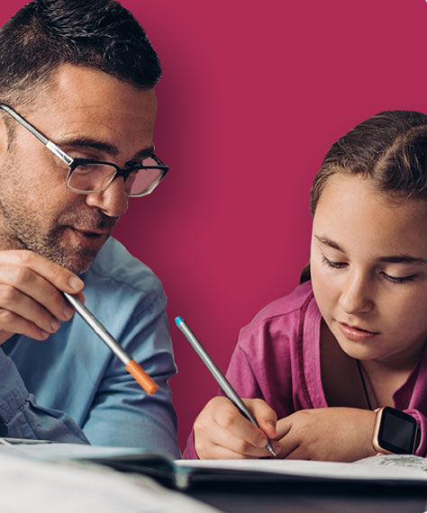 Man helping girl write